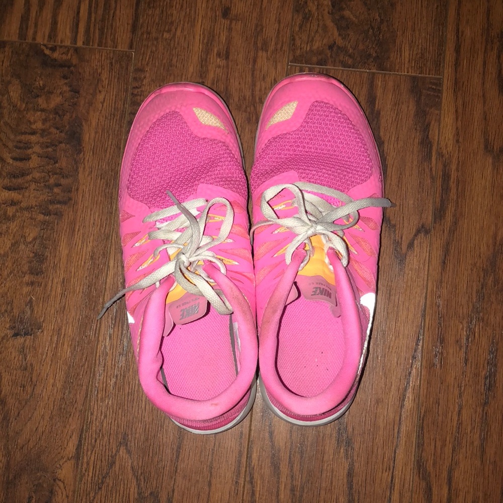 Nike pink free run tennis shoes size 6.5